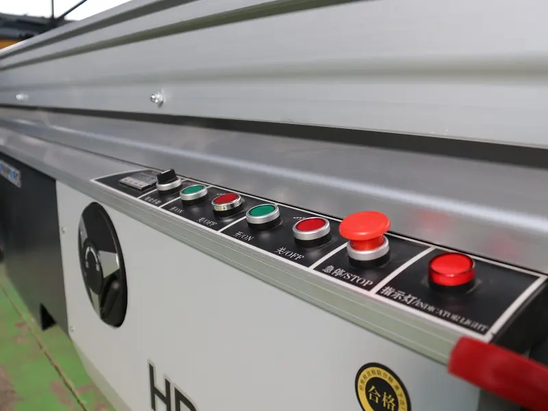 Table saw control buttons